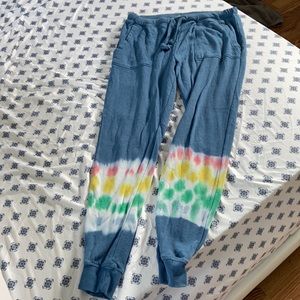 Blue sweatpants with tye dye at the bottom